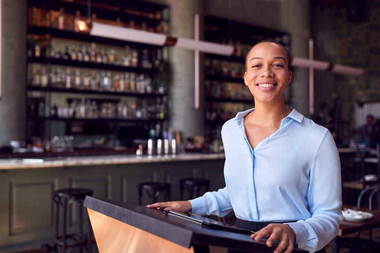 portrait of female owner of restaurant bar standin LKUGDQX